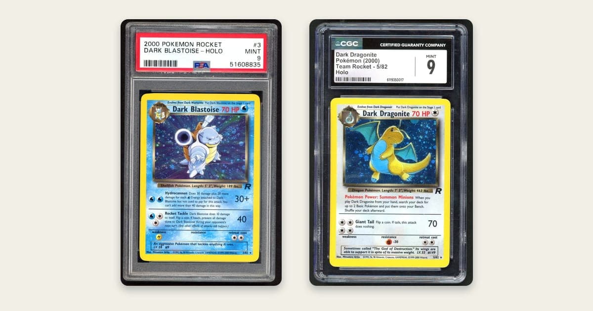 Two 2000 Team Rocket holos side by side, a Dark Blastoise in a PSA Mint 9 slab and a Dark Dragonite in a CGC Mint 9 slab